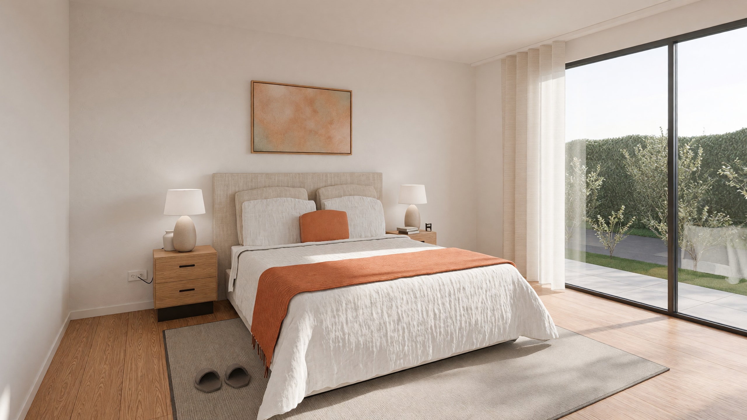 Main bedroom with an upholstered bed and a window onto the garden